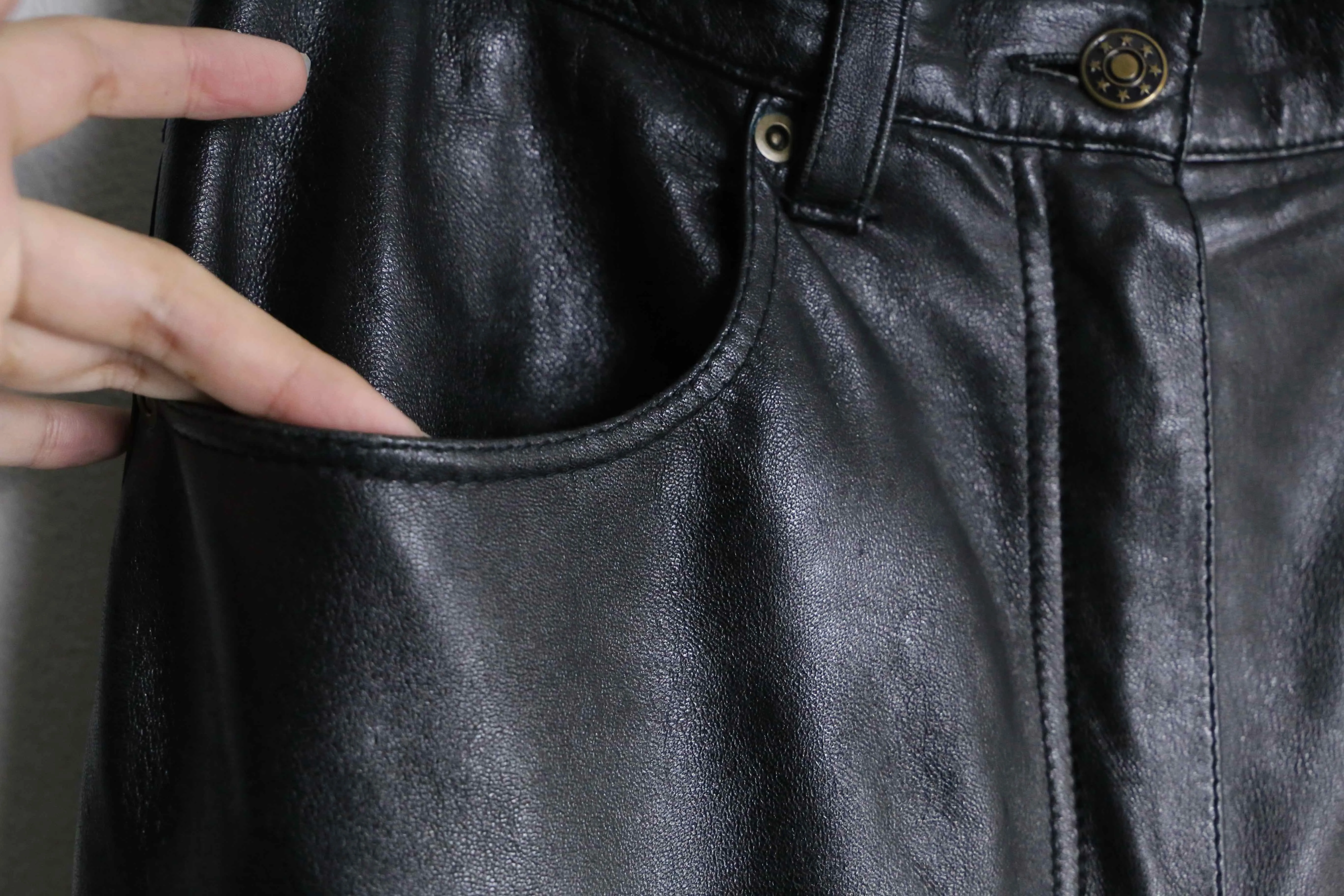 black color straight silhouette leather pants